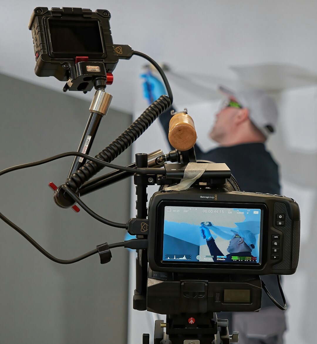 Video editor working on a multi-camera editing console